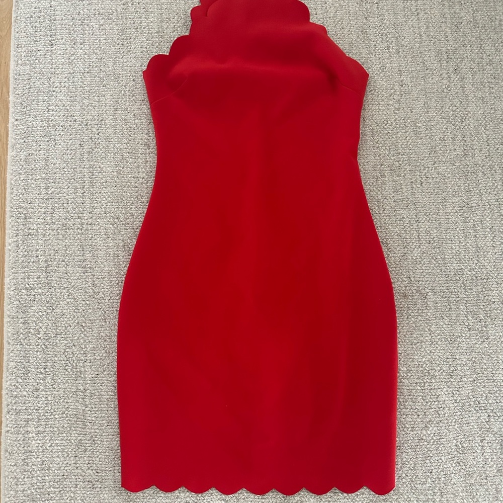Fitted red dress  goes to the knee. Size 2